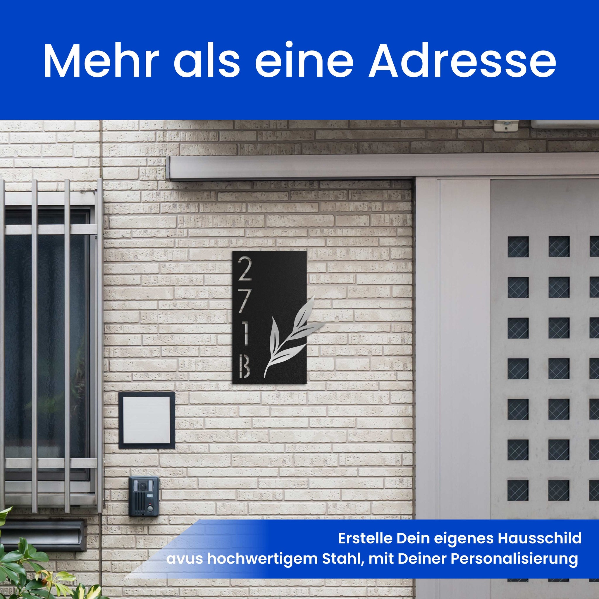 Geschmückte Hausnummer mit Blätterzweig