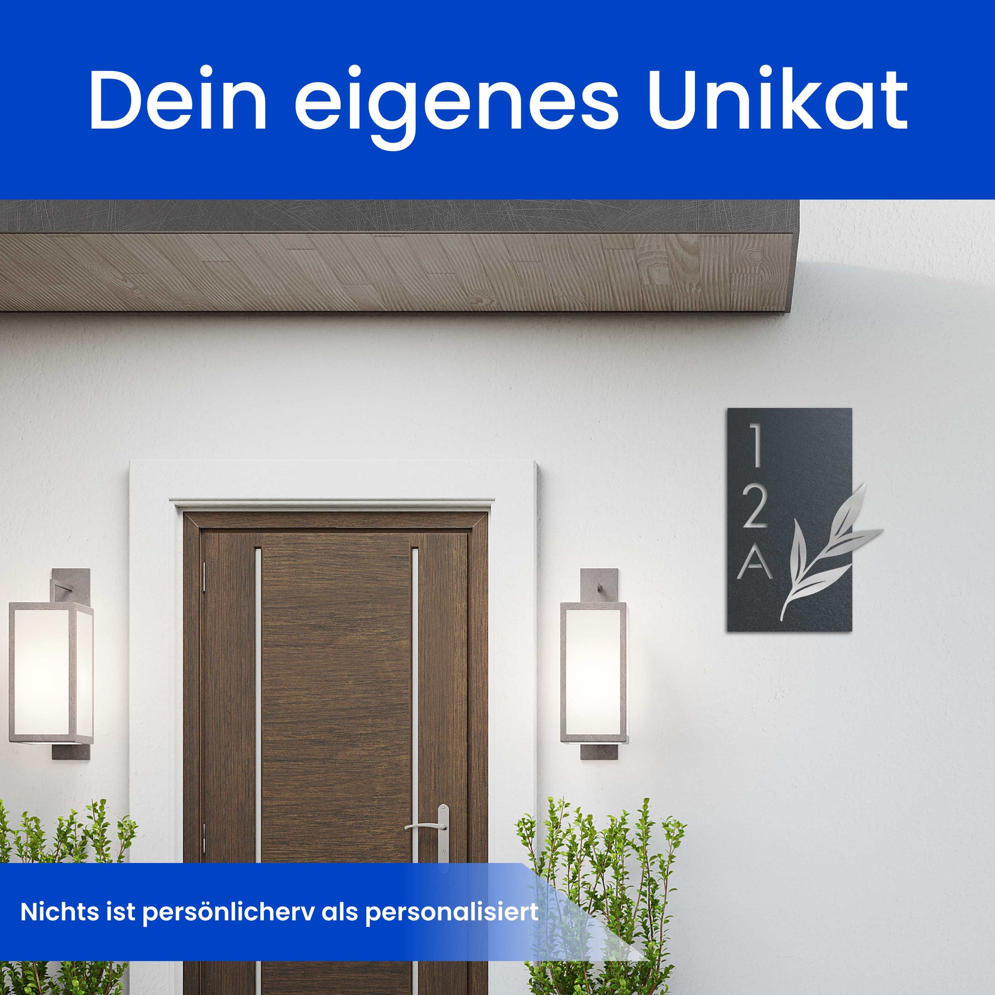 Geschmückte Hausnummer mit Blätterzweig